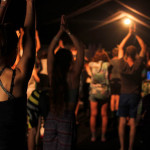 Music festival goers take part in the Lucyoga Dru Yoga class at the Beacons Music and Arts Festival, Skipton, North Yorkshire