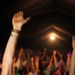 Music festival goers take part in the Lucyoga Dru Yoga class at the Beacons Music and Arts Festival, Skipton, North Yorkshire