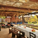 The covered terrace at the Lucyoga and Get Lost Retreats yoga retreat in Periana, Spain